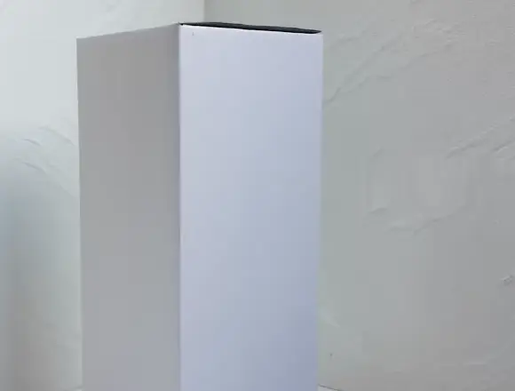 Simple white carton packaging example from supplied footage
